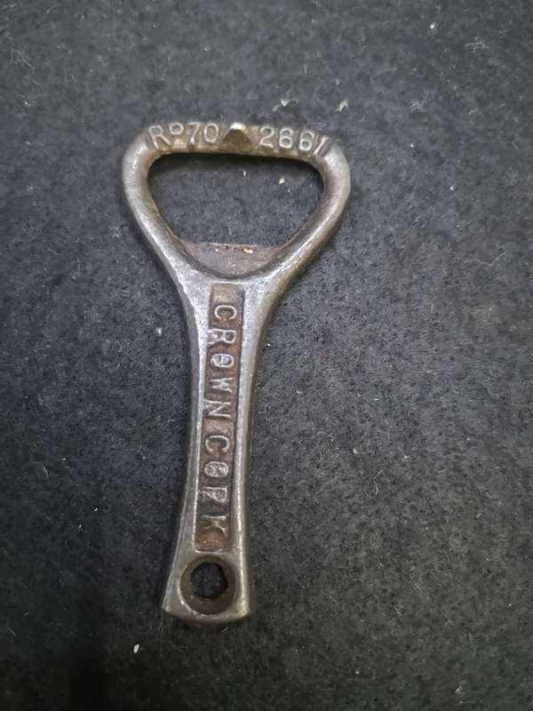 Crown cork bottle opener