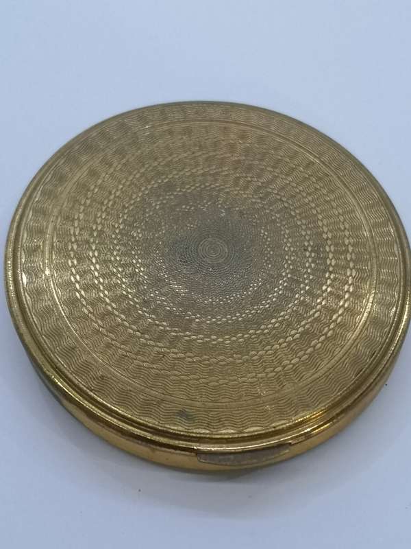 Powder compact