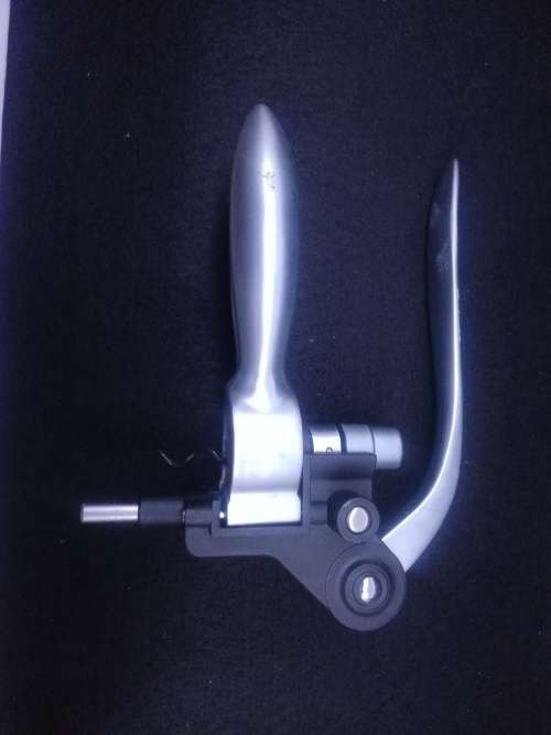 Pump action opener