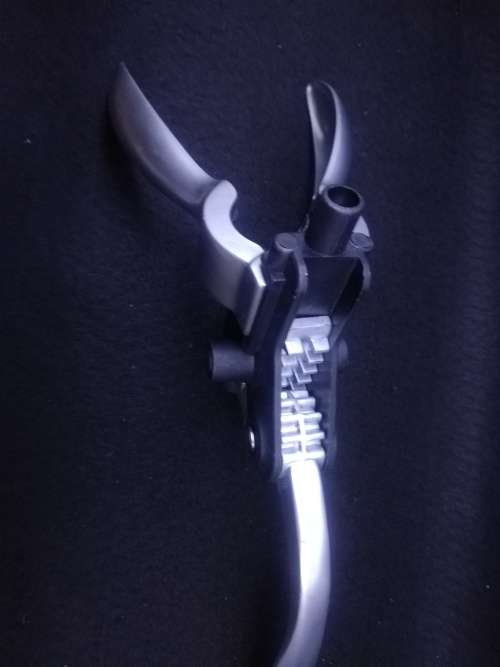 Pump action opener