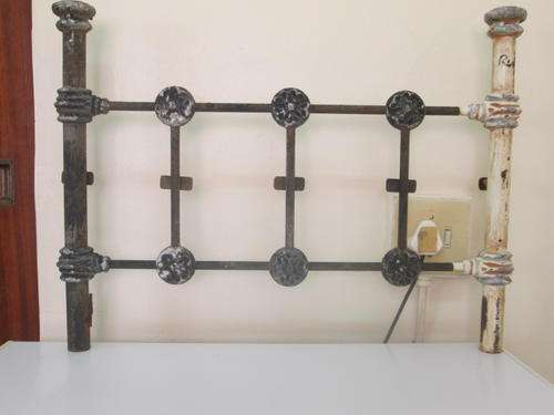 ANTIQUE ORNATE CHILD'S BEDSTEAD.(WHAT YOU SEE IS WHAT YOU GET)