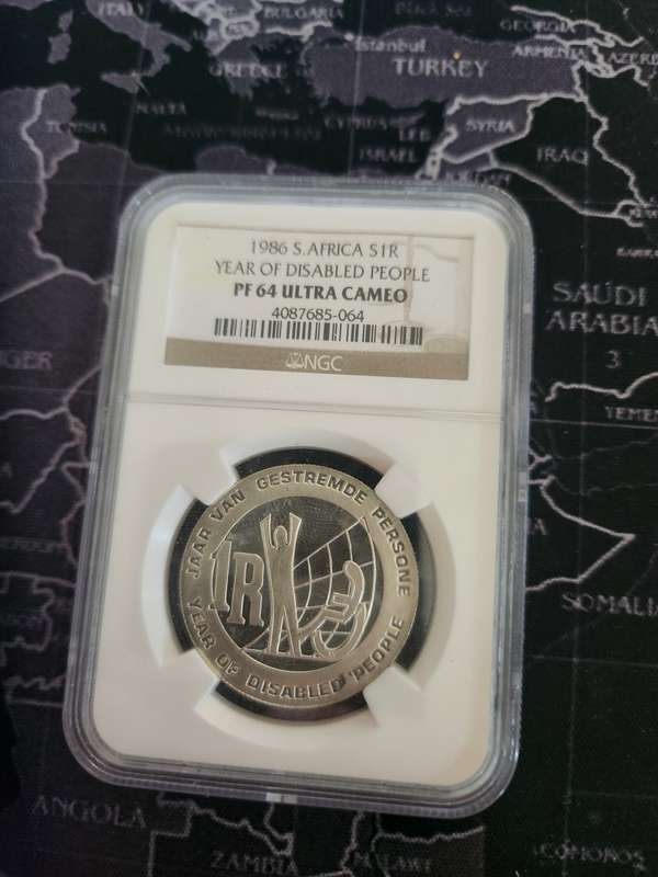 1986 Silver Pf 64 R1 - Year of the Disabled