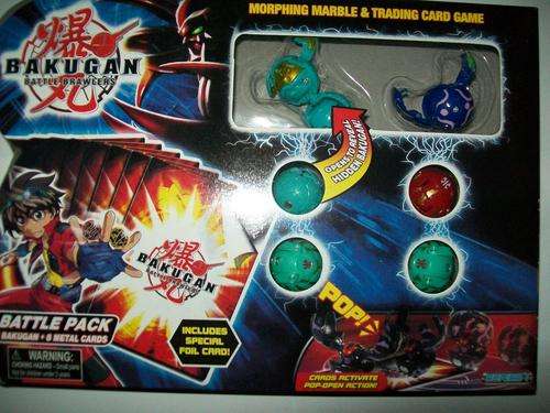 6 x Bakugan Battle Brawlers and 2 metal cards, 4 trading cards and rule book