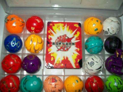18 x Large Bakugan Battle Brawlers and 18 game metal cards + Carrier case