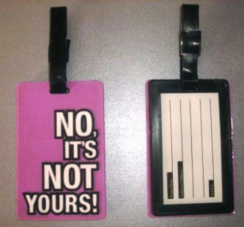 **QUIRKY** pink **NO, IT'S NOT YOURS** bag tag