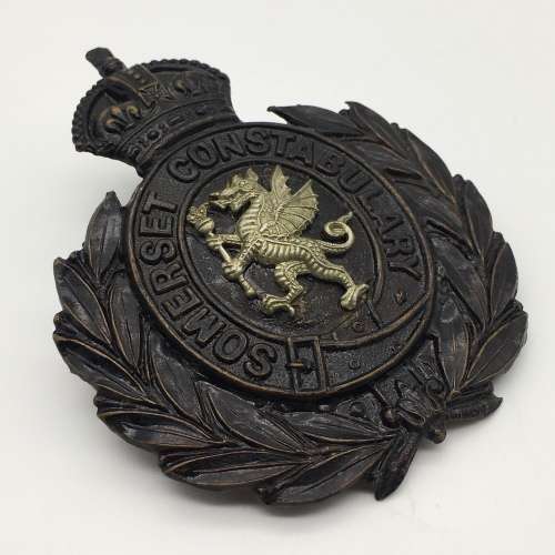British - Antique `Somerset Constabulary` Helmet Plate (white dragon)