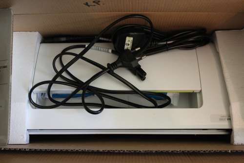 New & Unused HP Deskjet 2130 Printer,scanner & Copier. Includes brand new unopened ink set.