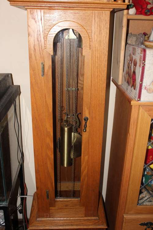 Stunning 2 metre solid Rhodesian Oak Grandfather clock 5 day movement(chimes need servicing)
