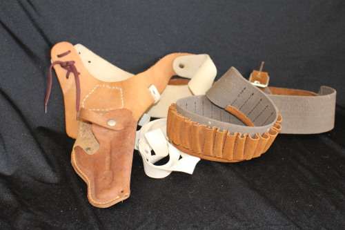 Genuine leather 9mm kidney holster and genuine leather and canvas bandolier both in v good condition