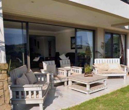 Patio Set 4 Seater Morris style chairs 2 seater couches benches coffee table picnic tables wooden furniture Windrush Cottage Furniture