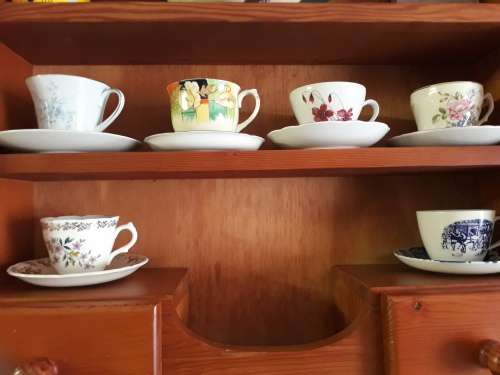 6 Different Cups and Saurces!   A Must have to your collection!