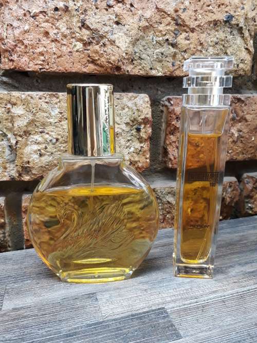 2 Bottels of perfume!  Nearly full still.  ORIGINAL PERFUMES
