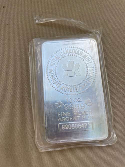 10 ounce solid silver Canadian Royal Mint bar opened circulated