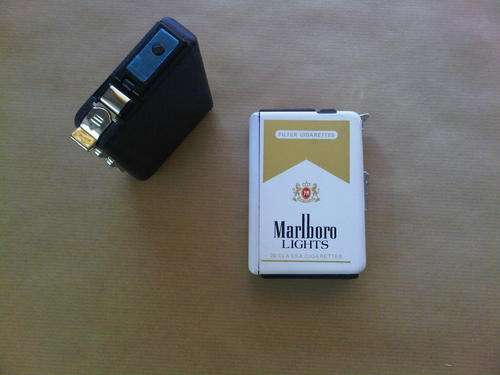 Cigarette Holder and Lighter in one.