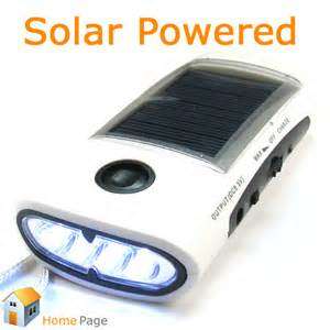 Solar Power 4 LED Torch Flashlight/FM Radio/Phone Charger all in one !