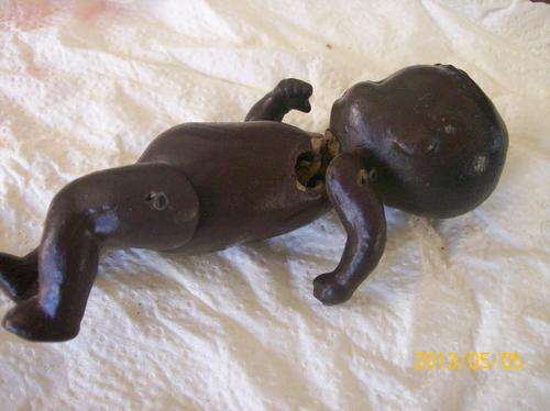 ONE SMALL BROWN BISQUIT DOLL F.F.ON THE BACK