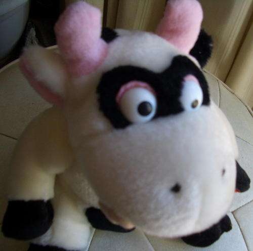 Mooing, Laughing Plush Cow