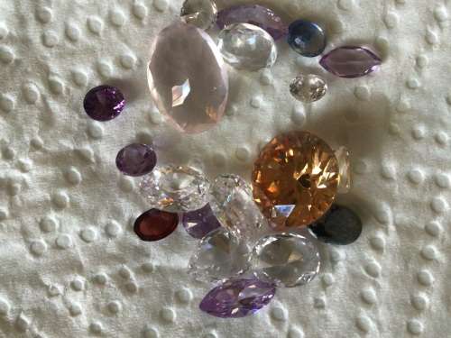 MIXED LOT +- 34cts.LOOSE GEMS, TANZANITE, RUBY,LAB GEMS, CITRINE, AMETHYST and TOPAZ. BID PER CARAT.