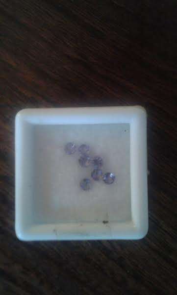 Deceased Estate."HEH".Natural Tanzanite. 7 x Rounds. Tcw 0.70ct . ERV. R1800.00. LOW START