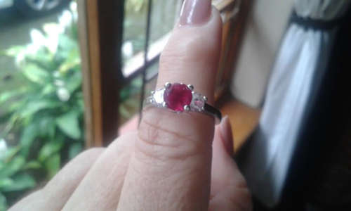CLEARANCE SALE, SILVER PLATED RING, RED CZ RUBY, SIZE 7.