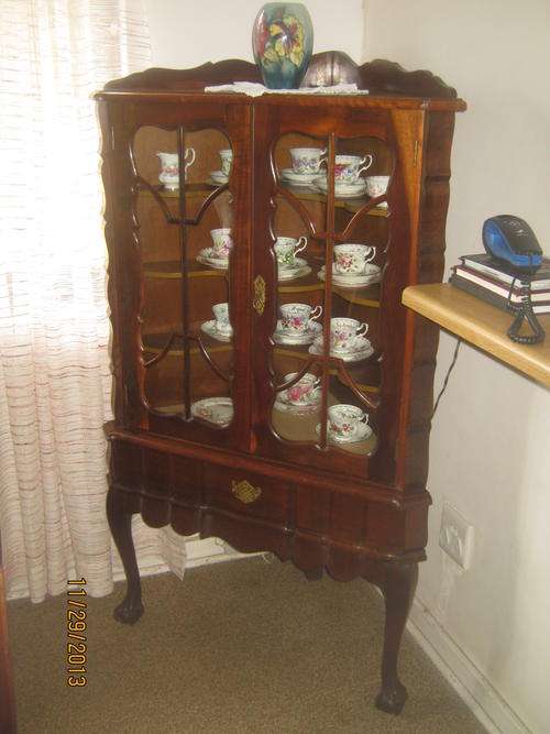 Large ball and claw corner display cabinet