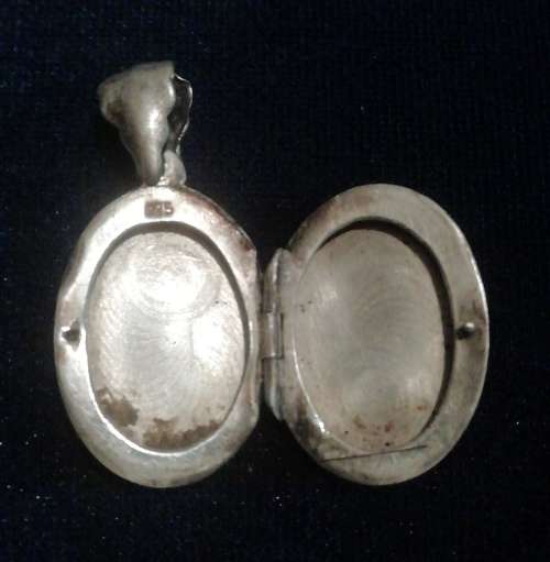 A Devine silver 925 locket
