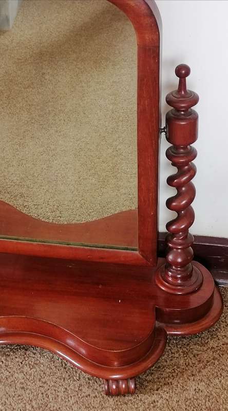 A Devine mahogany shaving or toilet mirror