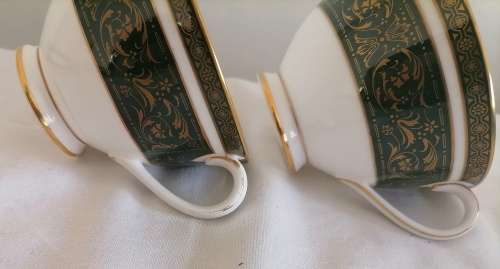 A superb pair of Royal Doulton Van borough trios