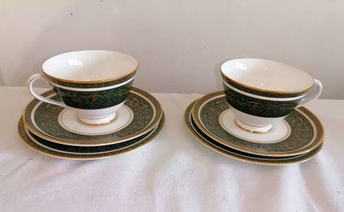 A superb pair of Royal Doulton Van borough trios