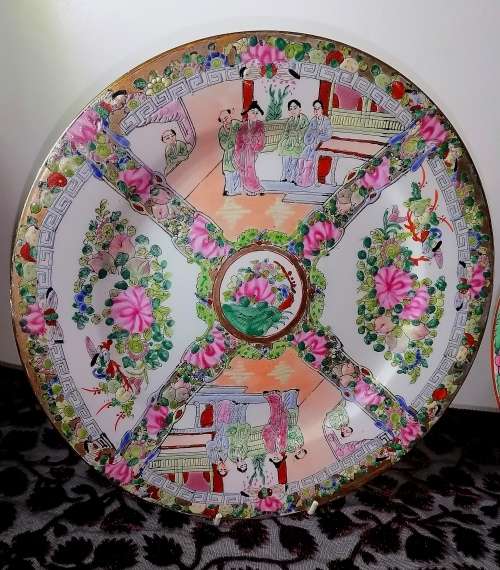 A stunning pair of vintage /antique famille rose plates