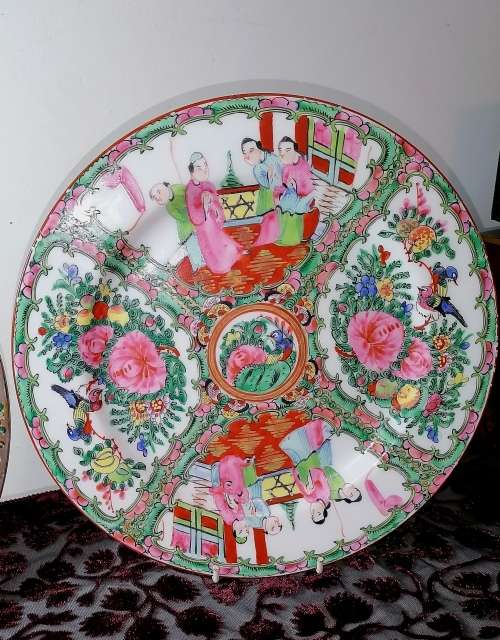 A stunning pair of vintage /antique famille rose plates