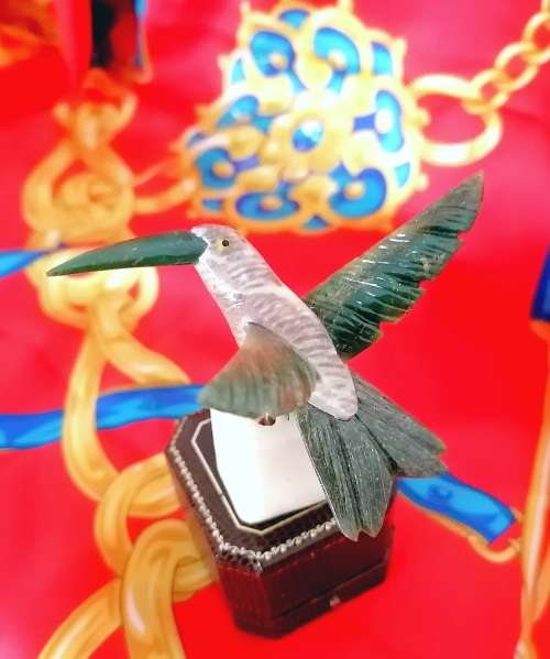 A stunning vintage Gem stone humming bird
