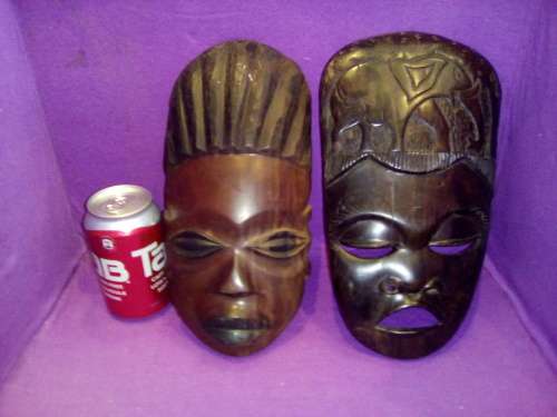 2 old hand carved African masks