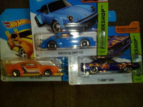 3 Assorted Hotwheels . New