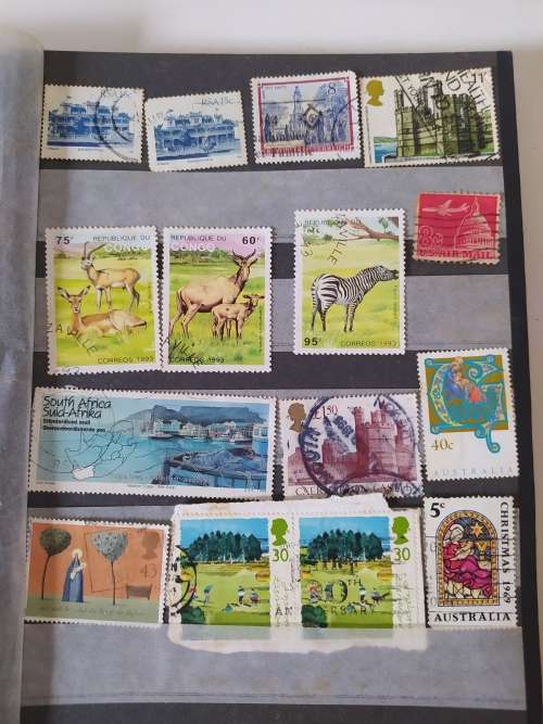 Stamp Collection including book (Approx. 60 used Stamps)