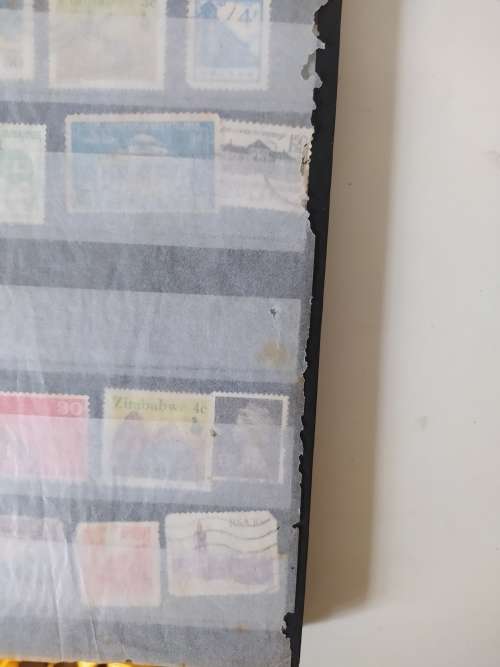 Stamp Collection including book (Approx. 60 used Stamps)