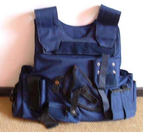 Blue bullet proof vest with ceramic plates which are 100% in tact.