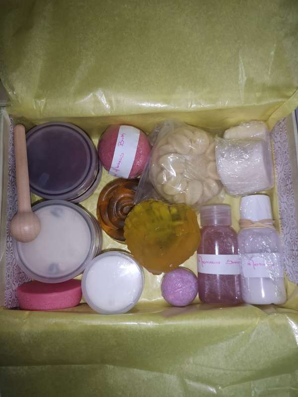 Gift Boxes with Handmade Soap, a Candle and some Handmade Bath Products
