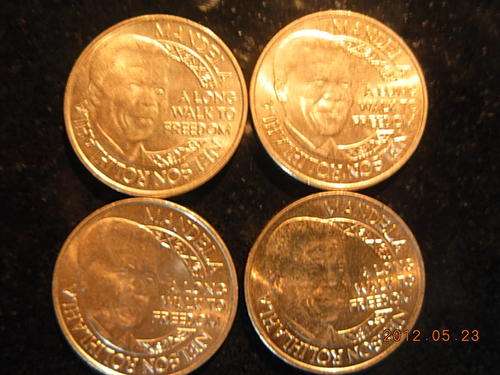 4x "a long walk to freedom" tokens, starting bids  @ only R1