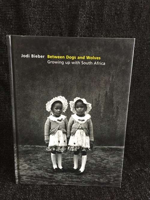 Between Dogs And Wolves - Growing Up In South Africa by Jodi Bieber