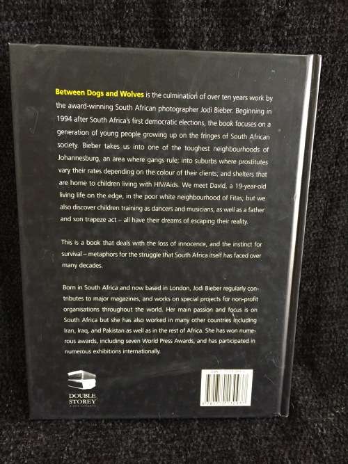 Between Dogs And Wolves - Growing Up In South Africa by Jodi Bieber