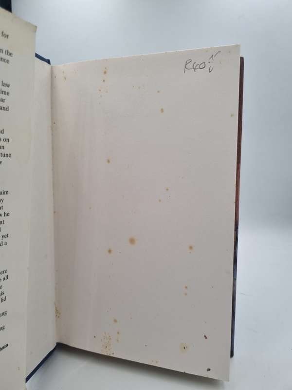John Grisham ~ The Rain Maker | Small format hard cover in fair condition