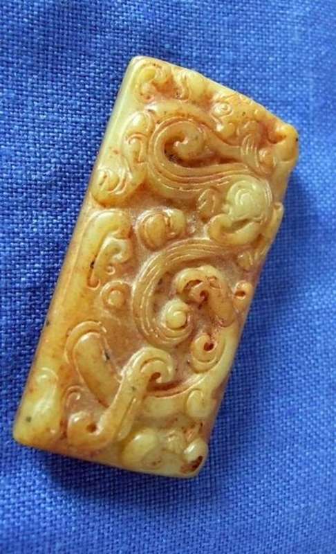 An old nephrite relief carved "dragon" pendant