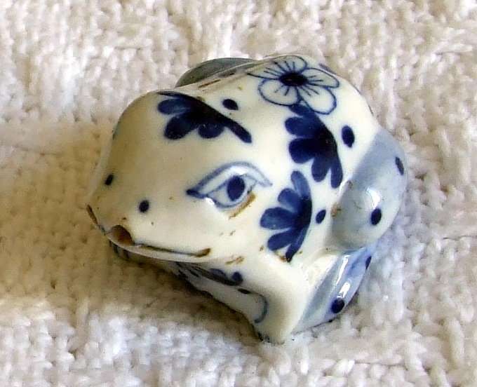 Vintage pair of blue and white Frog Salt & Pepper shakers with ceramic condiment spoon