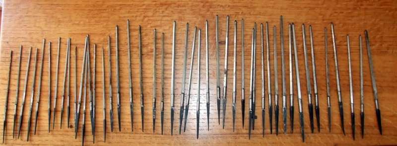 A large collection of assorted engraving tools