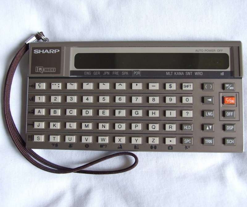 Vintage  SHARP IQ3100 Electronic Translator Calculator with 2 modules - French/Italian