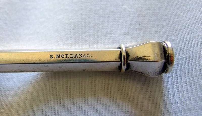 Impressive S MORDAN & Co. retracting mechanical pencil with blue/green agate  setting.