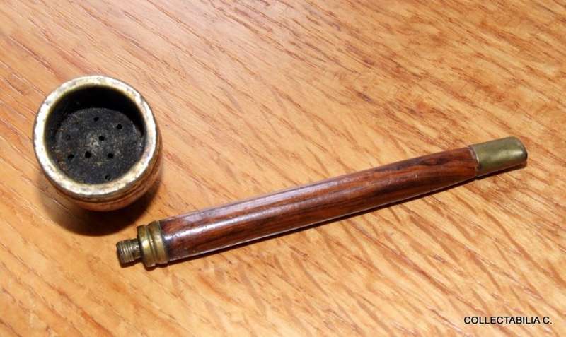 An old wood and brass estate pipe for smoking....whatever!