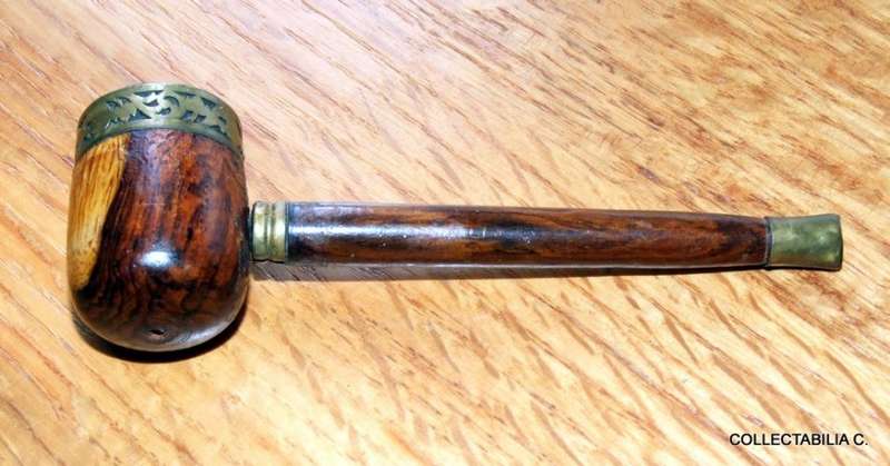 An old wood and brass estate pipe for smoking....whatever!