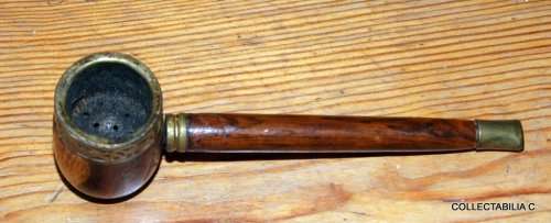 An old wood and brass estate pipe for smoking....whatever!
